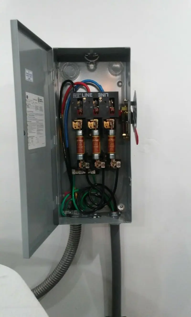 Three-phase disconnect switch installed for Smoke Detector Installation in Ken Caryl