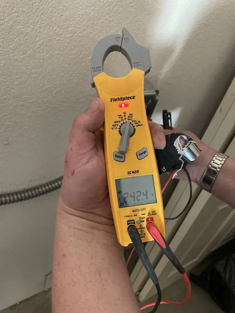 Voltage testing with clamp meter during Hot Tub / Pool Electrical Wiring in Ken Caryl